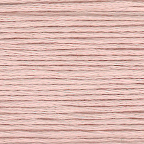 Close-up of warm pink embroidery floss-thread texture