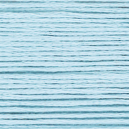 close up of blue embroidery floss-thread texture