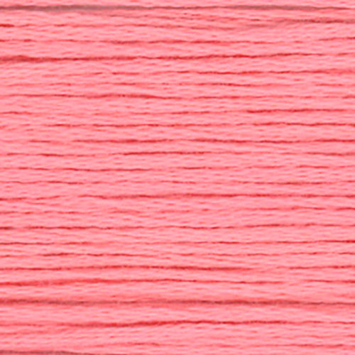 Close-up of a warm pink embroidery floss- thread texture