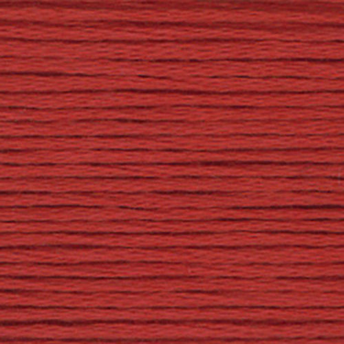 Close-up of a warm red pink brown embroidery floss- thread texture