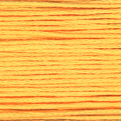close up of peach yellow embroidery floss thread texture