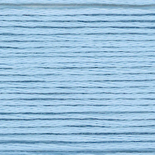 Close-up of light blue embroidery floss