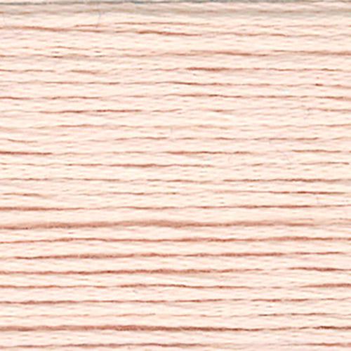 Close-up of warm pink embroidery floss-thread texture