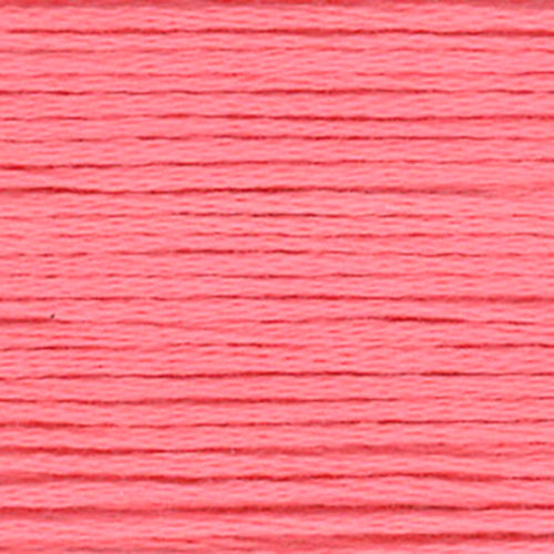 Close-up of a warm pink embroidery floss- thread texture
