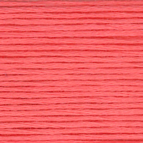 Close-up of a warm pink embroidery floss- thread texture