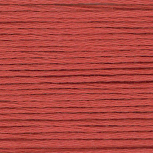Close-up of a warm red pink brown embroidery floss- thread texture